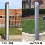 Comparing the Metallic Silver Skyline Decorative Bollard Cover in the sunlight and in overcast.