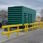 Heavy-Duty Guardrail sleeved in plastic used to protect a facility generator