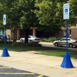 Blue Octagon plastic Sign Bases used for handicap accessible parking