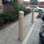 6-inch Architectural Decorative Bollard Covers used to protect sidewalk pedestrians from parking lot traffic