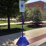Blue plastic Pyramid Sign Base used for handicap accessible parking