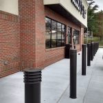 6-inch Cinco Decorative Bollard Covers used for storefront protection