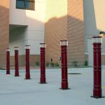 Row of red UV Lighted Decorative Bollard Covers