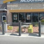 UV Lighted Decorative Bollard Covers used for storefront protection at McDonald's