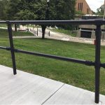 Black Pipe and Plastic Handrail