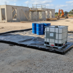 Construction site with drums and IBC