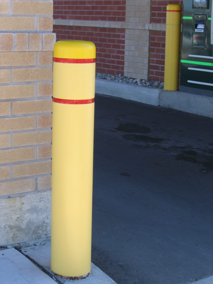 Faded competitor bollard covers.